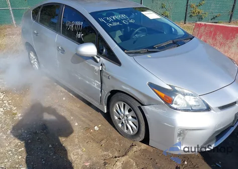 2014 Toyota Prius Plug-In z USA, uszkodzony, nr VIN JTDKN3DP6E3050779